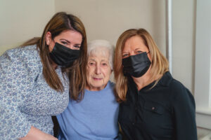 Wright center employees with elder patient