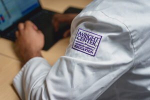 White lab coat with GME logo