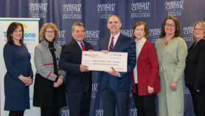 The AllOne Foundation provided a three-year grant award of $1.156 million in support of Telespond Senior Services that help older adults maintain their independence in the community. Telespond board members participating in the ceremonial check presentation, from left, are Maria Montoro Edwards, Telespond board; Anne Brennan, Telespond board; Joseph J. Grilli, president and CEO, Senior Day Services, a Telespond Company; John W. Cosgrove, CEO, AllOne Foundation; Nancy Menapace, Telespond board; Dr. Linda Thomas-Hemak, president and CEO, The Wright Centers for Community Health and The Wright Center for Graduate Medical Education; and Michelle Carr, Telespond board.