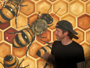Good of the Hive artist Matt Willey will deliver a lecture at Lackawanna College, in collaboration with The Wright Center for Community, on Friday, Sept. 2 at 6 p.m. He will also paint his trademark bee-themed mural on the side of the Civic Theater Building, 234 Mifflin Ave., in downtown Scranton. The mural will take about one month to paint.