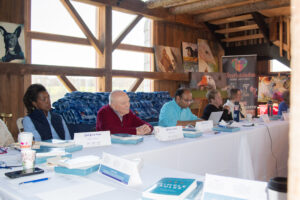 Board members sitting at a table during a meeting