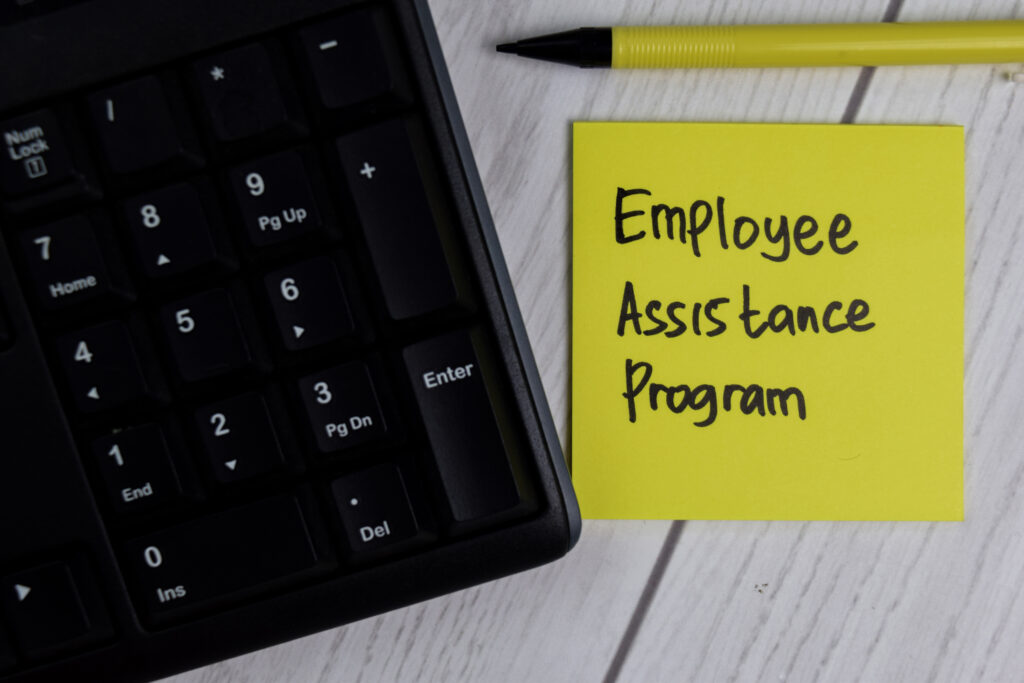 Employee Assistance Program text on sticky notes with office desk concept