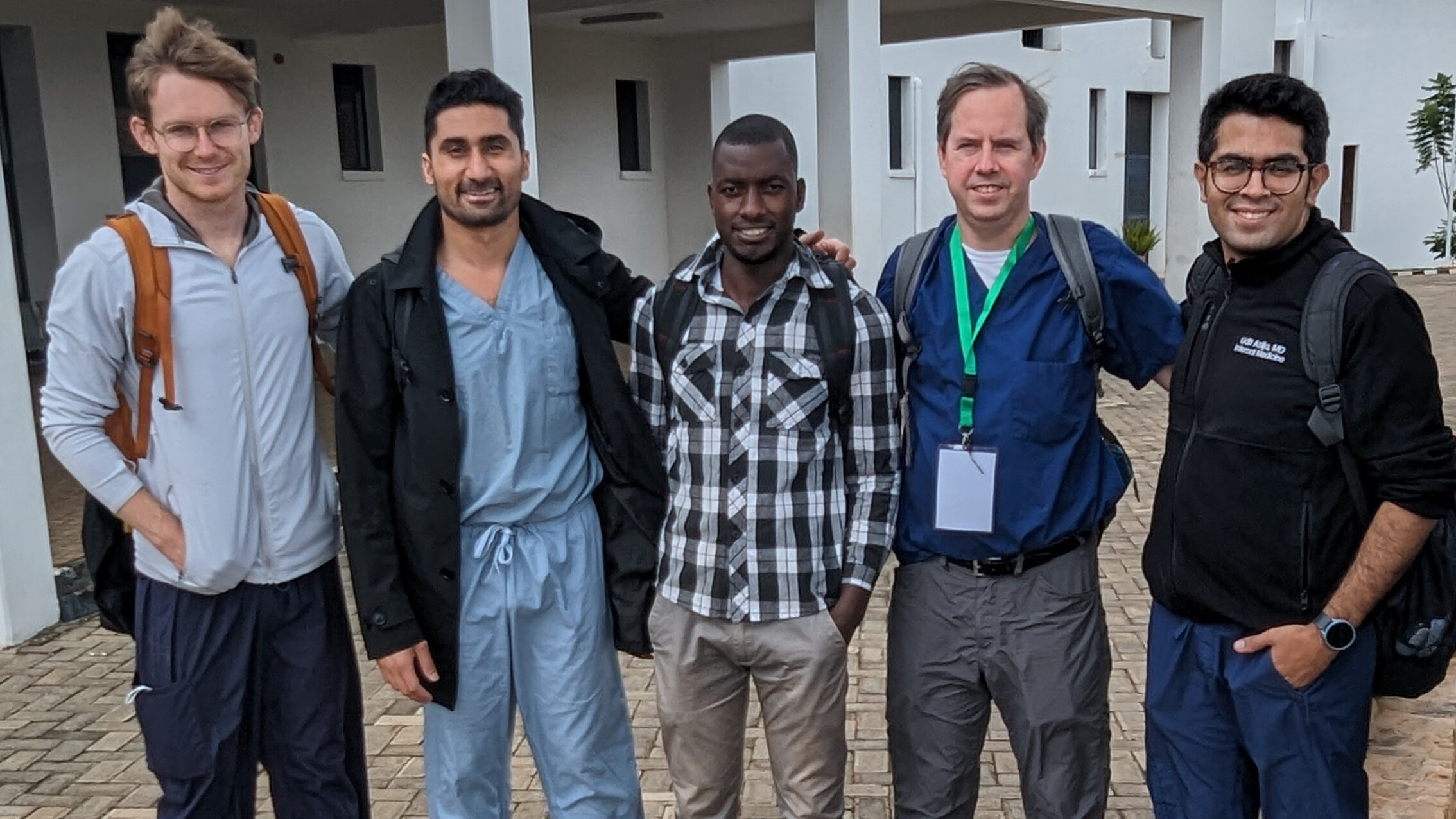 Wright Center Internal Medicine Resident Dr. Udit Asija with several colleagues at the Munini District Hospital in Rwanda
