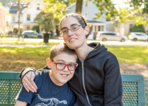 mother and son on bench together