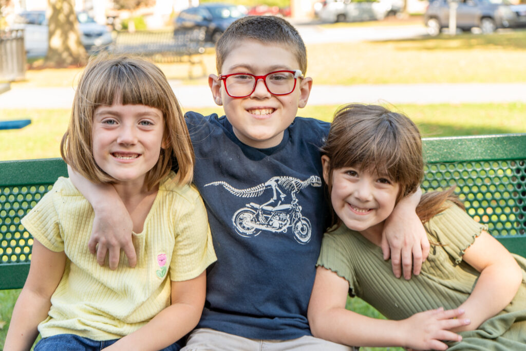Jake Algerio, 12, with sisters Zoey and Emma
