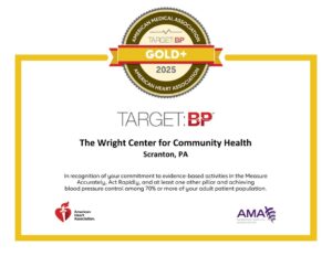 a graphic with the center awarded a gold plus badge from AHA