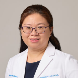 National Family Medicine Resident Physician Wei-Jen Yankelevich's headshot in white coat and glasses