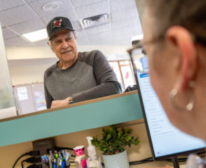 Rush Township resident Elmer “Butch” Richie, 82, checks in at The Wright Center for Community Health Tunkhannock for a well visit.