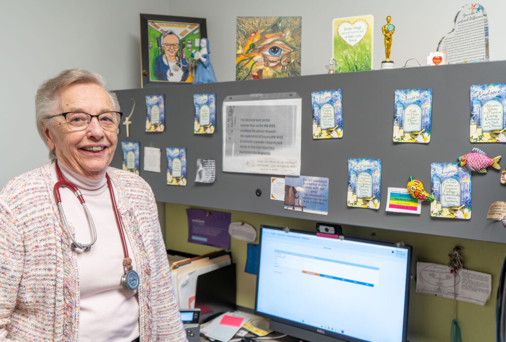 Sister Ruth Neely, a certified nurse practitioner at The Wright Center for Community Health’s Ryan White HIV/AIDS Clinic, surrounds herself with reminders of her work and her faith.