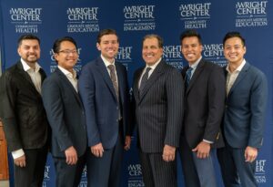 Graduates of our Physical Medicine & Rehabilitation Residency Program pose for a photo together with Program Director, Dr. Ken Gentilezza at The Wright Center for Graduate Medical Education's graduation. Left to right: Drs. Aliy Mirza Ahmed, Kevin Nguyen, Bradley Bierman, Kenneth Gentilezza, program director, Abhinav Arora, and Alan Trung Lam.