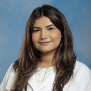 FM-Ohio resident Rafiya Muhammad Altaf headshot in white coat and on blue background
