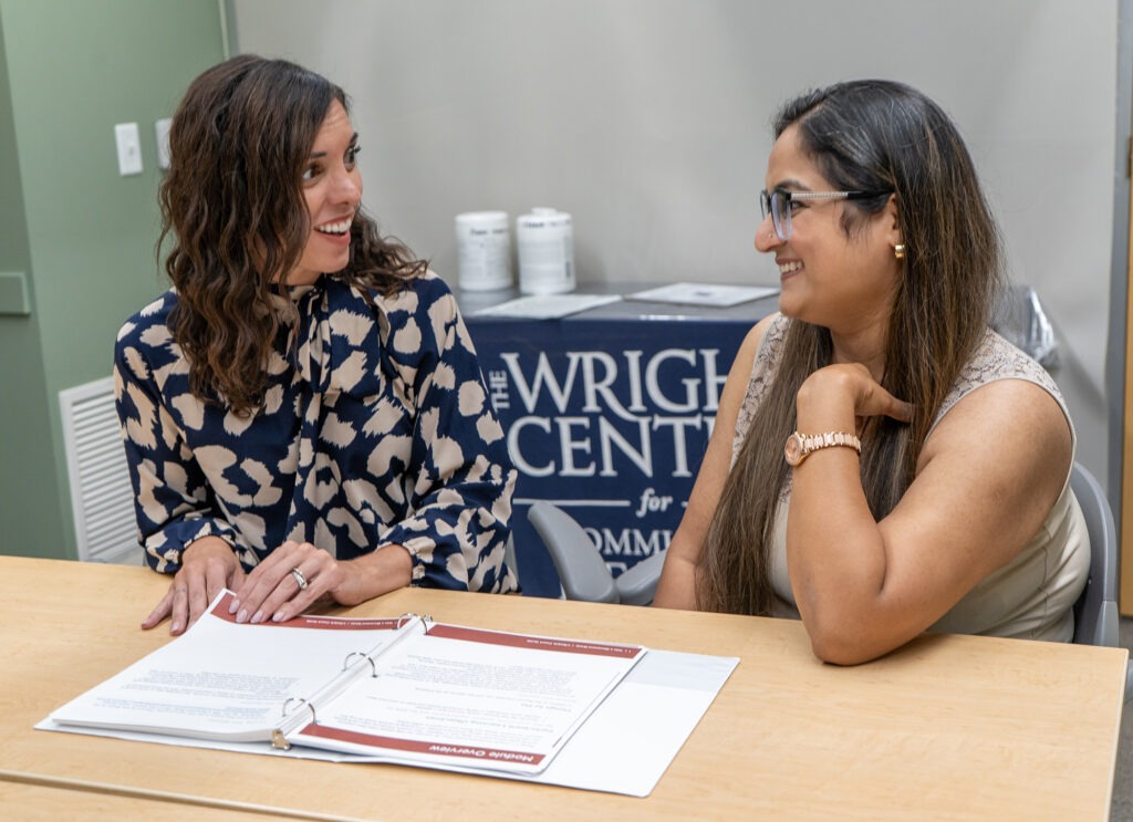 Melissa Germano, a registered dietitian and director of lifestyle modification and preventive medicine at The Wright Center for Community Health, left, talks with Asha, a patient, at a recent National Diabetes Prevention Program class at The Wright Center for Community Health Mid Valley. The 26-session, evidence-based program helps individuals with prediabetes lower their risk of developing Type 2 diabetes.