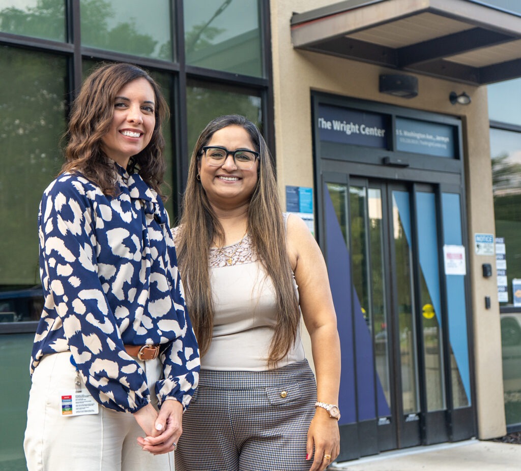 Melissa Germano, a registered dietitian and director of lifestyle modification and preventive medicine at The Wright Center for Community Health, left, goes over material with Asha, a patient participating in the National Diabetes Prevention Program class, at The Wright Center for Community Health Mid Valley.